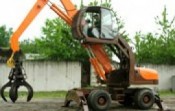 Аренда Колесный полноповоротный экскаватор